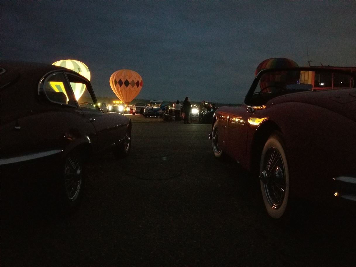 After dark it was fun watching the lighted balloons.  Shown here with Brian's E-Type and Glen's XK150.
