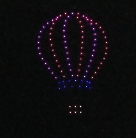 After the balloons, the lighted drones, about 100 of them, put on a performance.  They made a balloon shape.