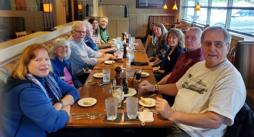 Seated clockwise around table were Sue Kingston, Sharon Case, John Blackburn, Ray Papineau, Lisa and Kent Wiken, Cheryl Jacobson, Trish Blackburn, Brian Case, Paul Petach.   Sue and Sharon had fun discussing a common interest in Koi!