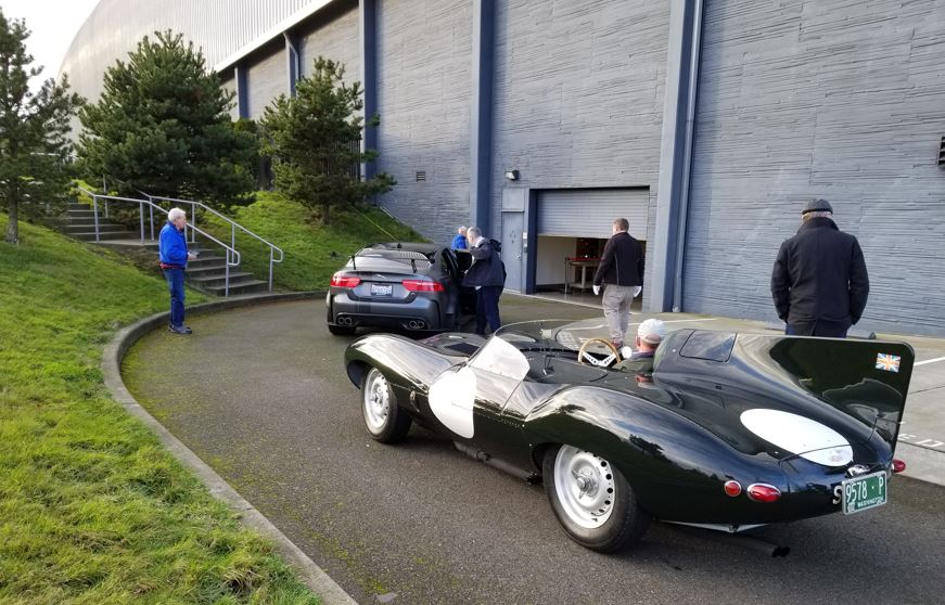 Cars lining up to enter LeMay. Tony Grayson with his Project 8 followed by Art Foley and his D-Type.