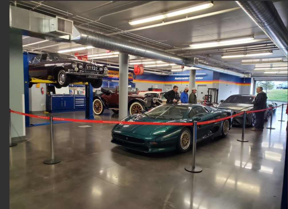 Cars on display with XJ220 in the front