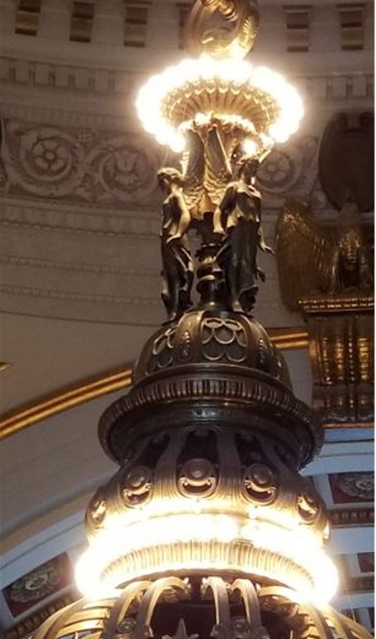 This photo shows the angels that are near the top of the chandelier.   These "small" statues are 4 feet tall!