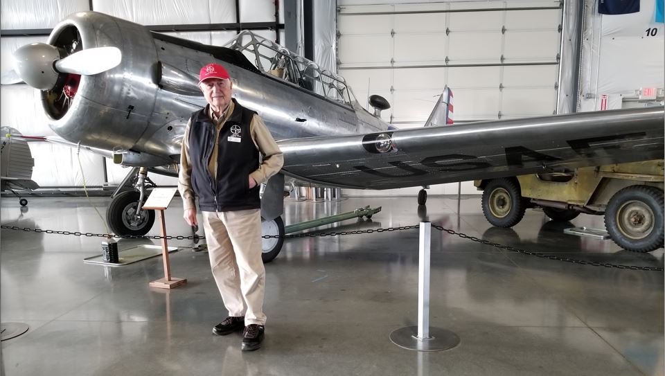 Glen Read in front of T-6 Trainer.  He had trained on the Canadian version of this plane.